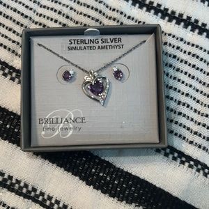 Sterling silver necklace and earring set with amethyst stones.